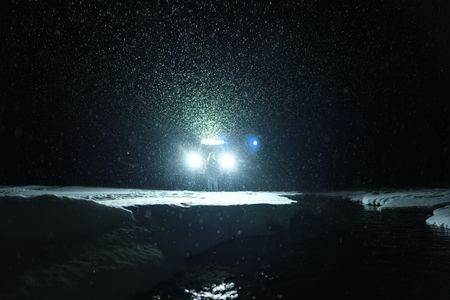 Sue Aikens finds fresh water after traveling back from the Artic Ocean at night. (BBC Studios Reality Productions, LLC/Jayce Kolinski)