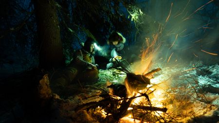 Ricko DeWilde and his daughter, Skarlett enjoy a meal together in the wilderness. (BBC Studios Reality Productions, LLC/Jensen Walker)