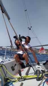 A camera operator filming on a sailboat. (National Geographic/Salvador Antonio Díaz Montes)