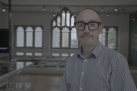 Campbell Price poses for a portrait at the Manchester Museum. in Manchester, UK. (Windfall Films)