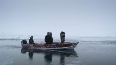Daniel, Ala, Chris and Nalu Apassingok hunt for walrus while traveling through the sea ice. (National Geographic)