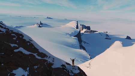 Conrad Anker reaches the top of a mountain in Antarctica.  (Mandatory credit: Cedar Wright)