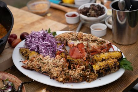 Maine - Lobster Thermidor with grilled corn, seaweed butter and yogurt slaw. (Credit: National Geographic/Justin Mandel)