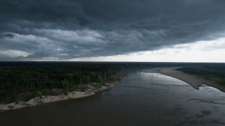 Storm clouds roll in over the Juruá River, a tributary of the Amazon.  (credit: National Geographic/Paulo Velozo)