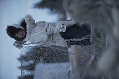 Agnes Hailstone gathering a fish net during the winter season. (BBC Studios Reality Productions, LLC/Jayce Kolinski)