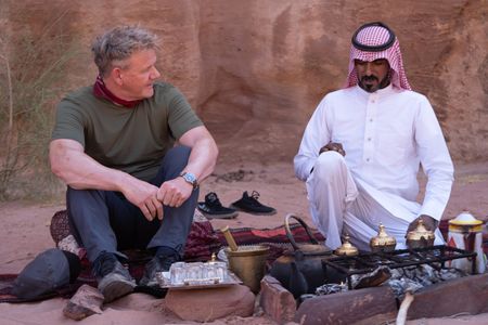 Gordon Ramsay enjoys bedouin coffee with Ali, a Bedouin farmer. (National Geographic/Justin Mandel)