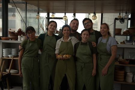 Chef Debbie Fadul and team pose for a group photo at restaurant, Diac·, in Guatemala City, Guatemala. (National Geographic/Adnelly Marichal)