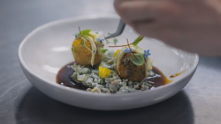 Final touches are added to the Innereien-Kroketten. (National Geographic)