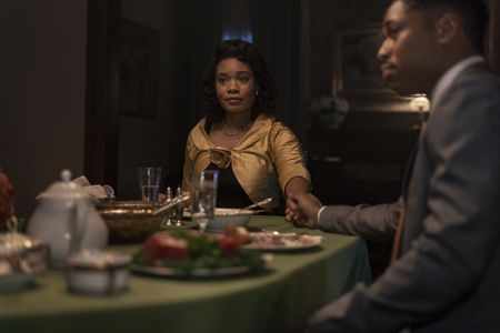 Coretta, played by Weruche Opia, and Martin, played by Kelvin Harrison Jr., have dinner with the King family in GENIUS: MLK/X. (National Geographic/Richard DuCree)