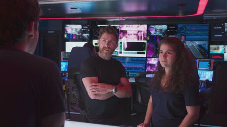 Aldo Kane and Melissa Marquez are on board the OceanXplorer to discuss their observations and findings. (National Geographic)