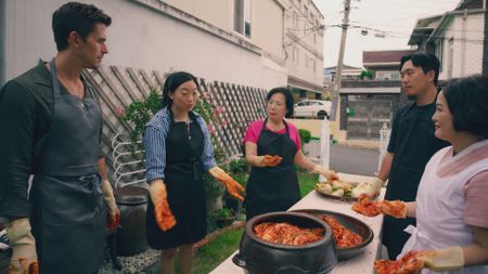 Antoni Porowski, Awkwafina, Insook Kim, Junho Lee and Shin Aga make Kimchi. (National Geographic)