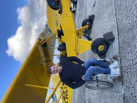 Arthur Williams is pictured next to plane at Biggin Hill for a flight to circle in the sea. (National Geographic/Jahlani Clarence)