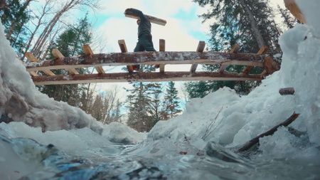 Billy walks across his man-made bridge. (Blue Ant Media/Tara Elwood)