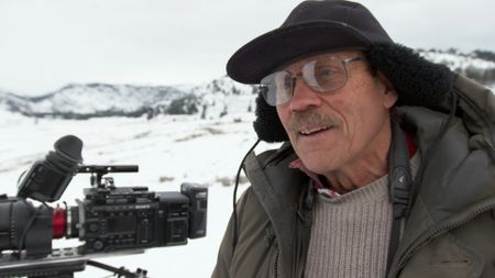 Wildlife photographer Bob Landis films in Yellowstone National Park. (National Geographic/Rick Smith)