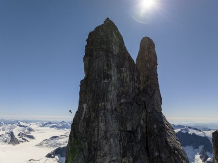 Alex Honnold and Tommy Caldwell simul-rappeling off of the East Cat's Ear Spire.  (National Geographic/Renan Ozturk)