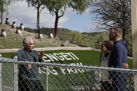 Cesar talks to Ashley and Derek before going into the dog park. (National Geographic)