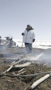Teresa Pingayak with her husband, John Pingayak in the tundra, hunting birds and cooking dinner. (National Geographic/Matt Kynoch)
