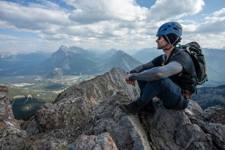 Joseph Fiennes enjoys the view from the top of Mt. Norquay along the Via Ferrata. Sir Ranulph Fiennes, "the greatest living explorer," and his cousin, actor Joseph Fiennes, revisit Ran’s 1971 expedition of Canada’s British Columbia.