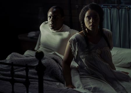 Earl Little, played by Gbenga Akinnagbein, and Louise Little, played by Parisa Fitz-Henley, are awoken in the night in GENIUS: MLK/X. (National Geographic/Richard DuCree)