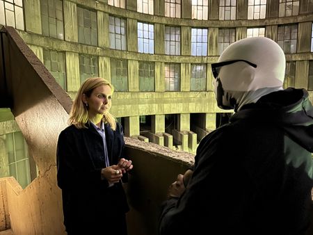 Mariana van Zeller interviews an ex-cop at Ponte Towers. (National Geographic for Disney)