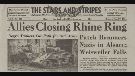 The Stars and Stripes front page of Nov. 27, 1944, shows Corporal Floyd Dade inside a tank. Corporal Dade served with the 761st Black Panther Tank Battalion in WW2. (The Stars and Stripes)