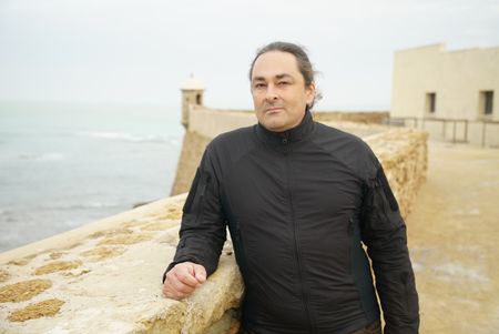 Claudio Lozano stands atop Matagorda fort in Cadiz, looking over the Bay of Cadiz. The fort was used to defend against the french navy in the penninsular war in Spain. (National Geographic/Ciaran Henry)