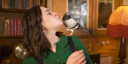 A contributor poses with a pigeon. (Big Wave Productions)