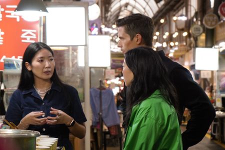 Jain Song, Antoni Porowski and Awkwafina explore Korean street food at Tongin Market. (National Geographic/Rebecca Eishow)