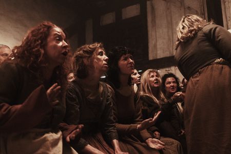 A group of accused witches look disappointed and frustrated by the proceedings. (Dash Productions Services LTD/Antoan Ivanov)