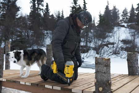 Joel Jacko builds a dock in the winter season. (National Geographic/Wayne Shockey)