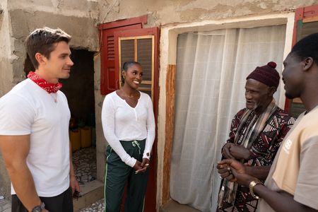 Antoni Porowski, Issa Rae, Papa Abdoulaye Sene and Hamade Ndiaye at the compound. (National Geographic/John Wendle)