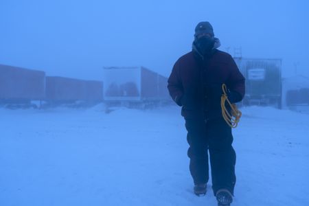 Sue Aikens in a winter storm at her camp. (BBC Studios Reality Productions, LLC/Jayce Kolinski)