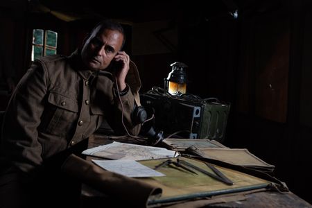 Captain Anis Khan (played by Shammi Aulakh) is pictured in a historic reenactment scene for "Erased:  WWII Heroes of Color." Captain Anis Khan was a member of Force K6, a little-known Indian regiment of mule handlers in WW2. Amidst the chaos of Dunkirk and the advancing German Army, the Indian regiment fought for victory and independence. (National Geographic/Harriet Laws Herd)