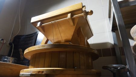 A traditional grain mill is in use in Hakan Do?an's bakery, Pasto, in Bursa, Turkey. (National Geographic/Madeline Turrini)
