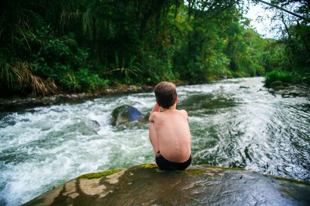 Laurent Pelletier rests from swimming in Ecuador. (Credit: MRC/Jean-SÈbastien Francoeur)