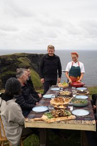 Gordon Ramsay and Chef Anna Haugh present their dishes to the local contributors. (National Geographic/Justin Mandel)