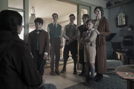 A SMALL LIGHT - Young Miep meets her adoptive family for the first time as seen in A SMALL LIGHT. (From left: Agi Tietjen as young Miep, Noah Leggot as young Cas, Tadeas Mesdagh as young Van, Simon Mesdagh as young Jacob, Vladimir Holman as young Hendrick, Benjamin Higgis as young Johan, and Cosima Shaw as Genofeva). (Credit: National Geographic for Disney/Dusan Martincek)