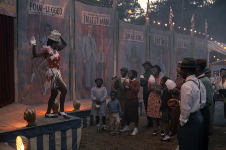 A performer is watched by the crowd at the fair as seen in GENIUS: MLK/X. (National Geographic/Richard DuCree)