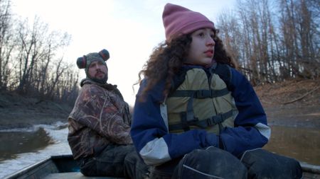 Chevie Roach and his daughter, Sydney travel across the Innoko River in search of beaver. (BBC Studios/Brian Bitterfeld)