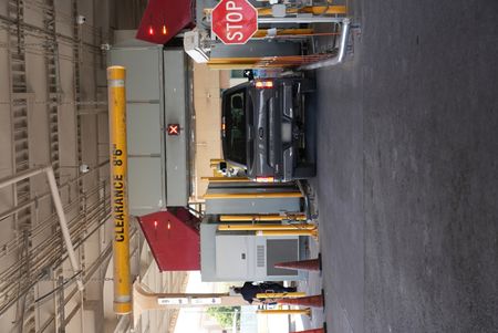 A traveler's vehicle is passing under the Z-Portal X-ray at the El Paso border in order to detect hidden contraband. (National Geographic)