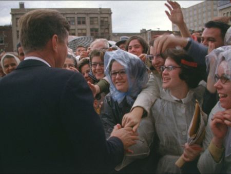 People in the crowd greet President John F. Kennedy outside the Texas Hotel in Fort Worth, Texas in Nov. 1963. (John F. Kennedy Presidential Library and Museum, Boston)