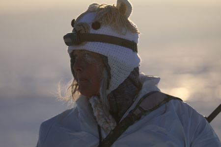 Sue Aikens hunts during the winter season, camouflaging with the winter arctic terrain. (BBC Studios Reality Productions, LLC/Lauren 'Bird' Dixon)