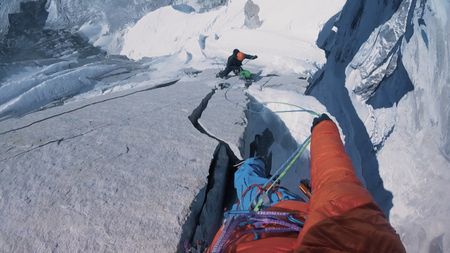 Point of view of David Lama high up as he climbs Lunag Ri, in the Himalayas, and looks down at Conrad Anker, who climbs behind.  (Mandatory credit: Red Bull Media House)