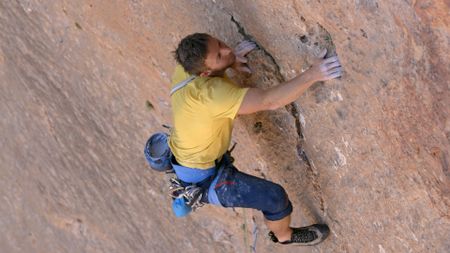 Tommy Caldwell climbs Babel, the first of three routes he and Alex Honnold are climbing as part of a triple link-up.  (photo credit: National Geographic)