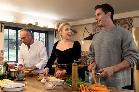 Clinton Pugh, Florence Pugh and Antoni Porowski prep the roast dinner. (National Geographic/Chris Raphael)