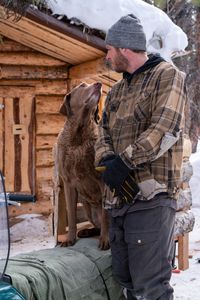 Java tests out the sled box seat made by Johnny Rolfe. (BBC Studios Reality Production/Patrick Henderson)