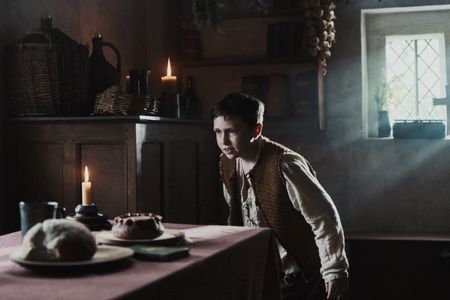 The young boy observes food set out on the kitchen table. (Dash Productions Services LTD/Antoan Ivanov)