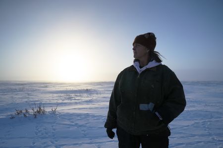 Sue Aikens hunts for ptarmigan in the tundra during the winter season for subsistence food. (BBC Studios Reality Productions, LLC/Jayce Kolinski)