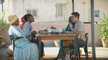 Aissa Diop, Issa Rae, Marie Diop, Moi Ndeye Fatou and Antoni Porowski about to eat Soupe Kanja. (National Geographic)