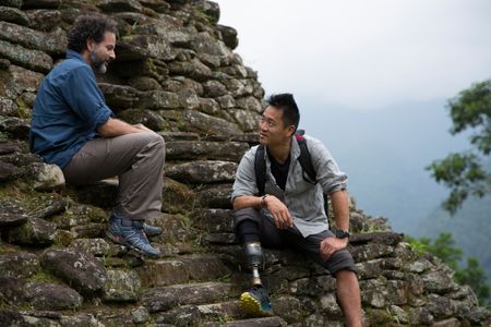 Ciudad Perdida, Colombia - (R) Dr. Albert Lin and archaeologist Santiago Giraldo on one of the terraces of Ciudad Perdida, talking about the history of the ancient city and the Tairona people who built it. (Blakeway Productions/National Geographic)